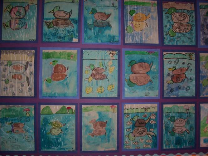 "Rainy Day Reflections" mirror-image duck paintings, 2nd grade