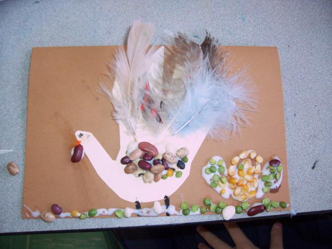 1st grade hand-turkey bean/feather mosaics