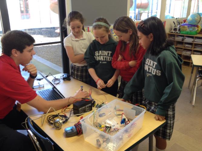 Jesuit Robotics visits 4th grade Science