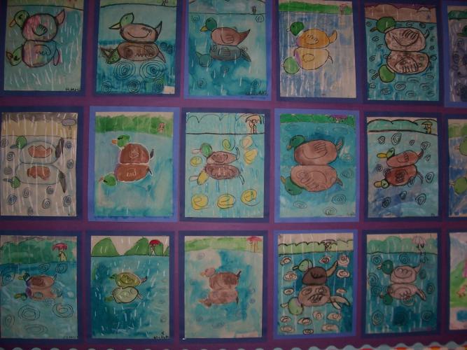 "Rainy Day Reflections" mirror-image duck paintings, 2nd grade