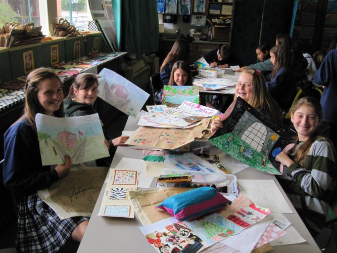 Students showing their perspective drawings
