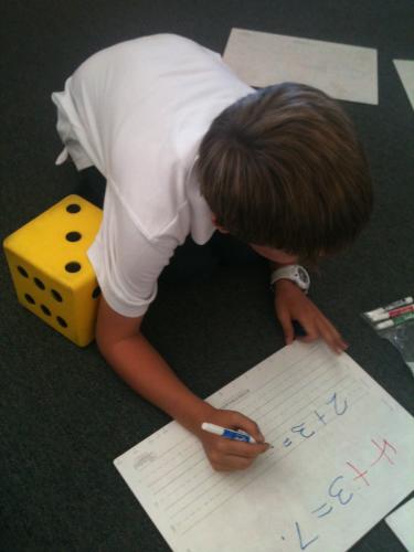Using dice to practice our math facts.